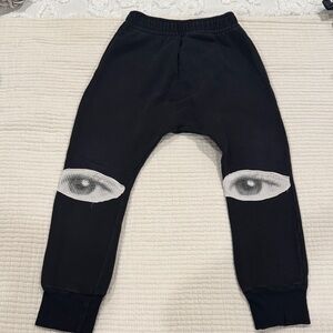 nununu Black Joggers with Eye Design